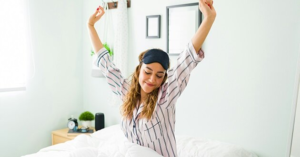 Woman waking up refreshed, illustrating what a circadian rhythm is and its impact on daily energy